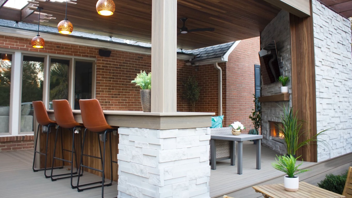 Covered outdoor deck with built-in features in Delray Beach